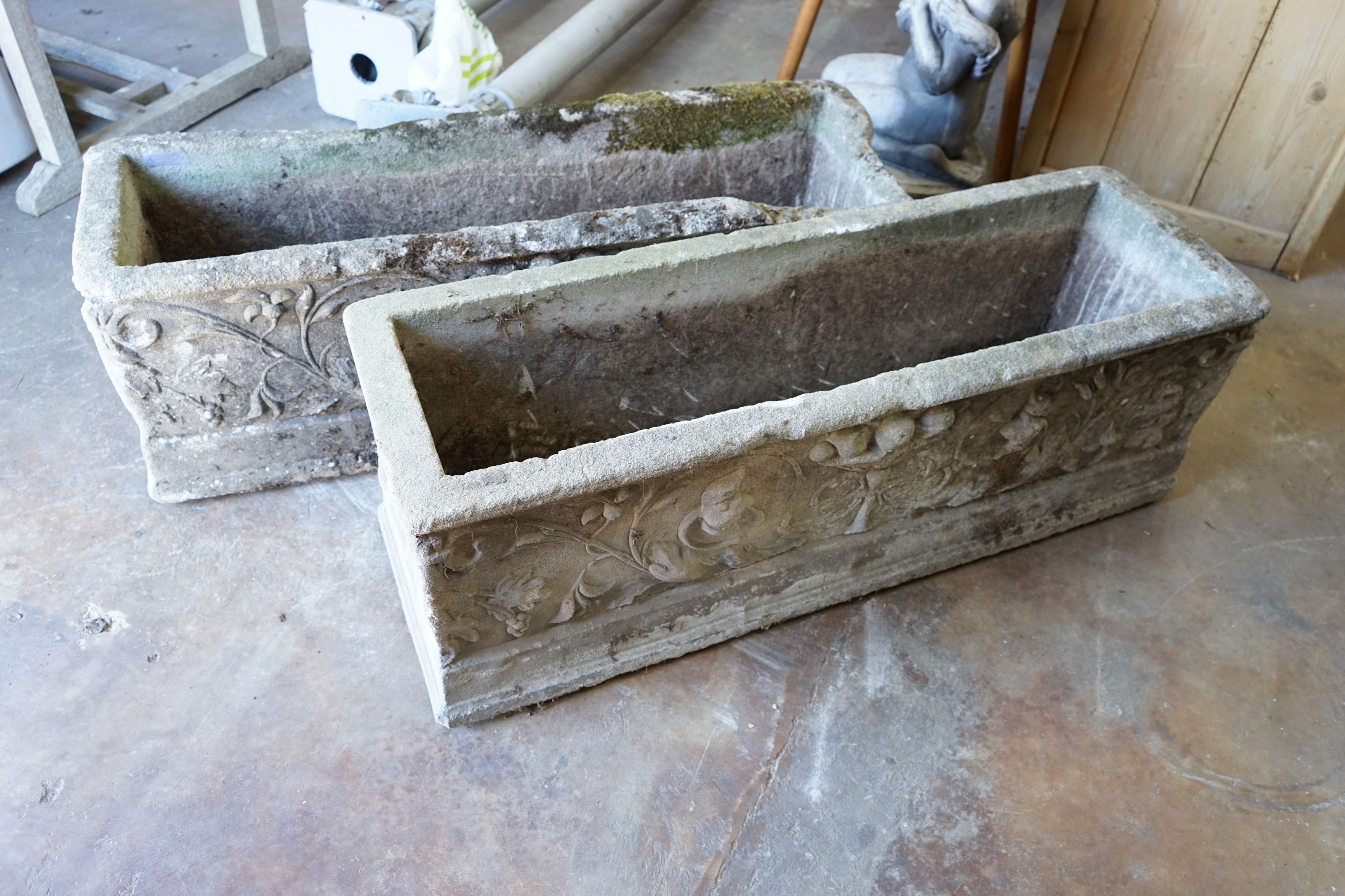 A pair of large rectangular reconstituted stone garden planters, width 117cm, depth 38cm, height 39cm